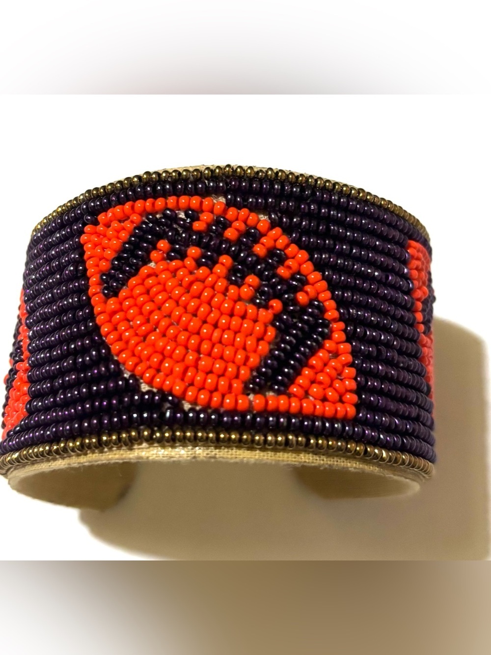 Hand-Beaded Cuff Bracelet with Orange Football Motif